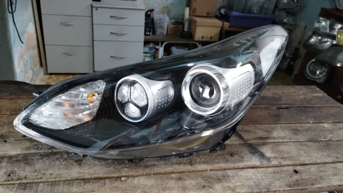 Farol esquerdo Kia Sportage 17/21