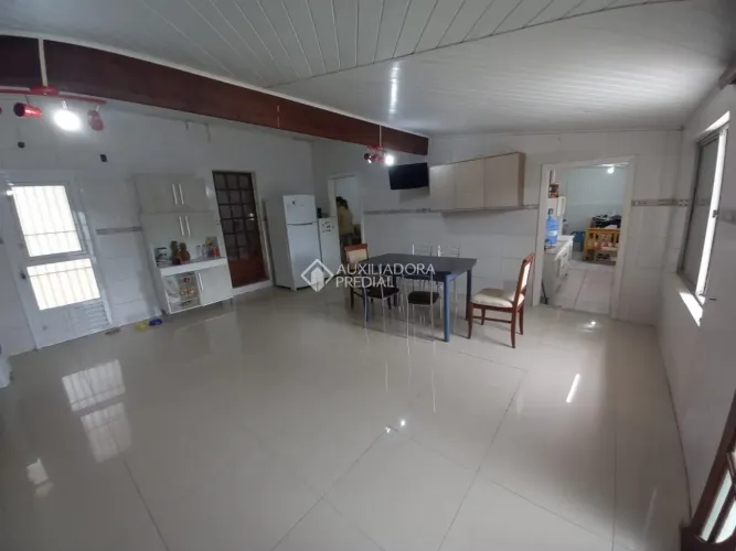 Diferenciada casa com 3 dormitórios