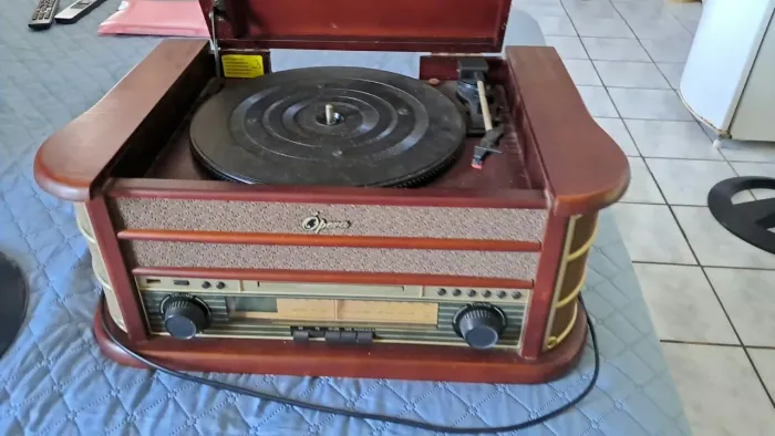 Toca discos opera 7 em 1
