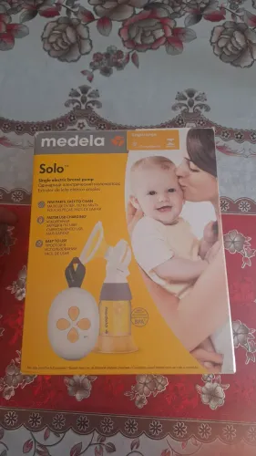 Bomba elétrica de tira leite da medela