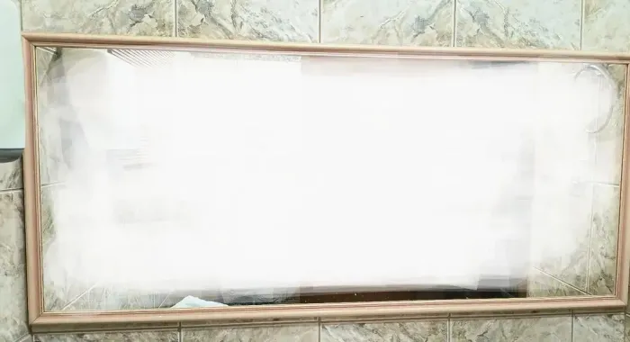 Espelho com moldura