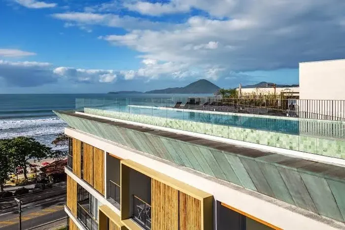 Apartamento em condomínio frente mar Praia Grande