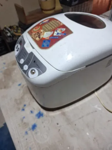 maquina de fazer pao funcionando