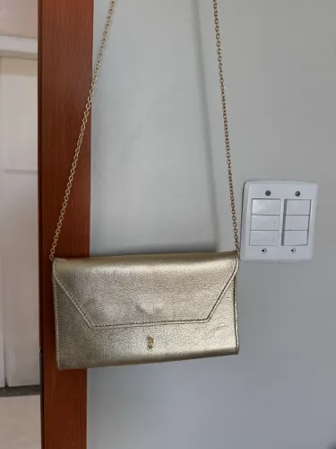 Bolsa Santa Lolla dourada