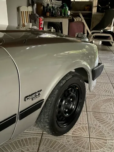 ARO+Pneu+Calota 4x100 185/60/14 VW/GM/Outros Tala