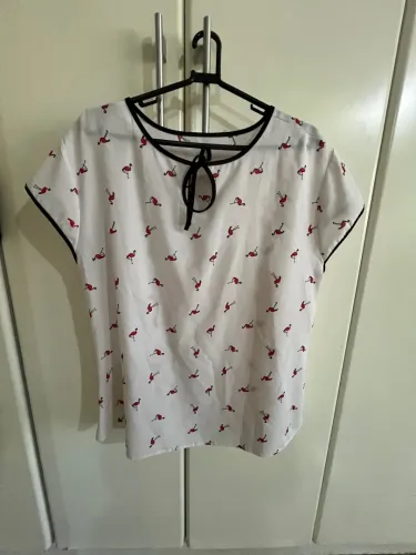 Blusa estampa flamingos