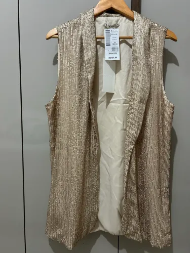 Colete dourado Dzarm