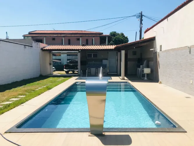 Alugo Casa alto padrão 3/4 suíte 2 piscinas praia do sol