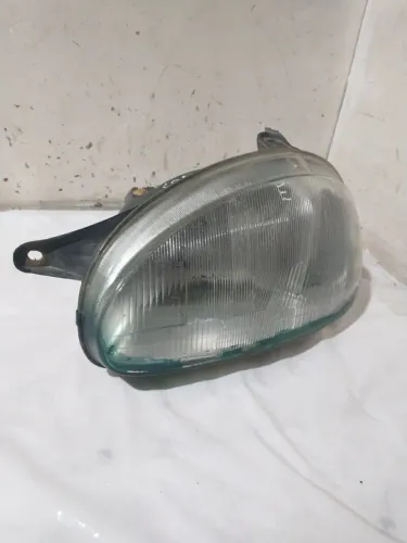 Farol Dianteiro esquerdo Corsa 98/05