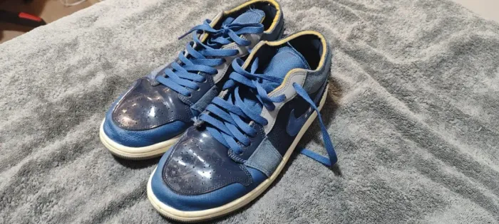 Tênis Air Jordan 1 low SE Craft colorway obsidian