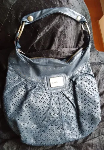 Vendo bolsa de couto legítimo.
