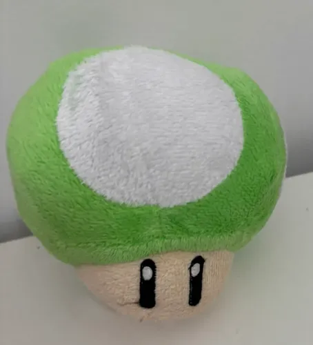 cogumelo de pelúcia verde do universo Mario Bros l 