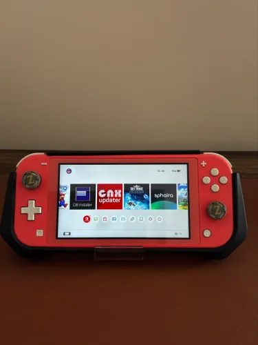 Nintendo Switch Lite Coral DES.BLO.QUEADO + Case