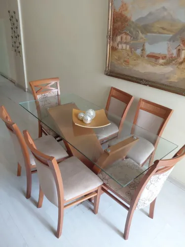 VENDO MESA DE VIDRO COM 170 CENT E 6 CADEIRAS EM ÓTIMO ESTADO 