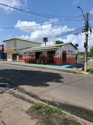 CASA COM PONTO COMERCIAL, VALOR R$ 400.000,00