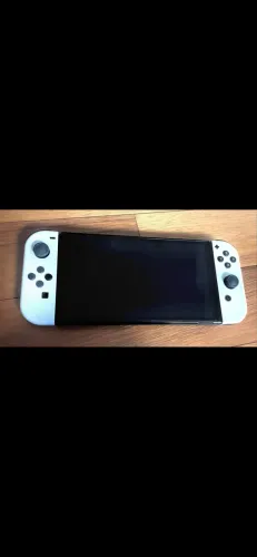 Nintendo Switch OLED + Mario Odyssey + Controle + Volantes + Case