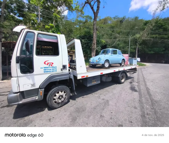 Reboque e transporte de veículos e outros.