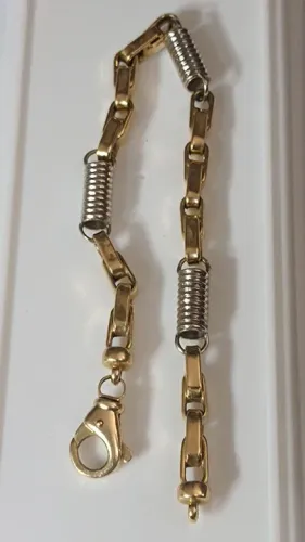 Pulseira em ouro amarelo e detalhes ouro branco 22 centímetros