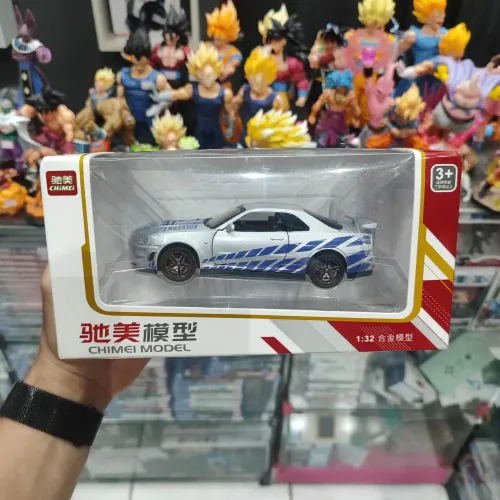 Miniatura Carro GTR Skyline de Metal com Luzes Alarme e Fricção Produto Novo - Faço Olxpay