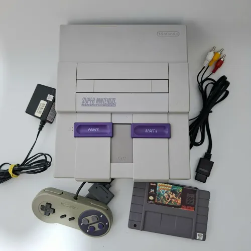 Super nintendo completo com jogo congo's caper