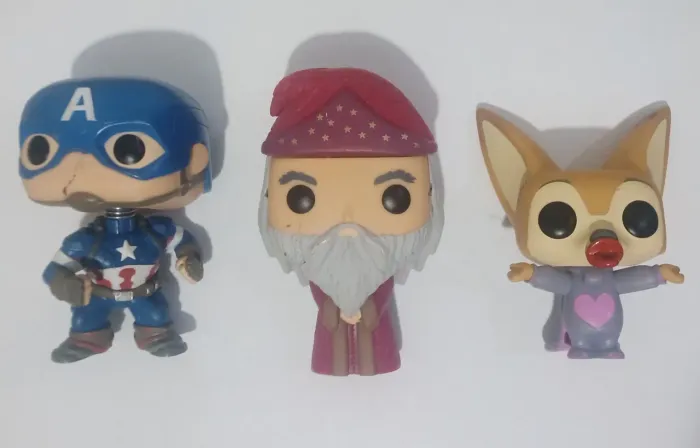 Funko pop Zootopia Dumbledore e capitão América.
