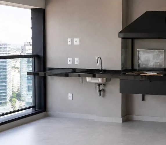 Bancada gourmet em granito com cuba e churrasqueira
