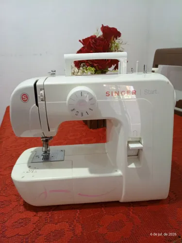 Máquina de costura singer