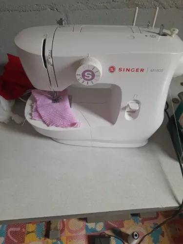Vende essa máquina de costura 700