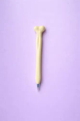 Caneta formato de ossos