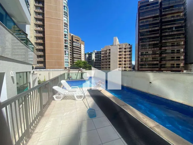 Apartamento com 3 dormitórios para alugar, 107 m² por R$ 5.885,51/mês - Praia da Costa - V