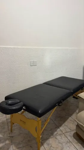 Maca de massagem com ajuste de altura.