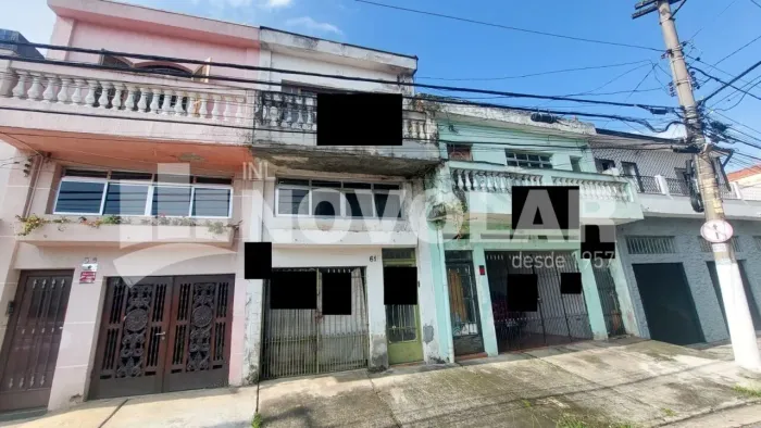 Terreno com 14 metros de frente, na Vila Maria . Com Construção Antiga