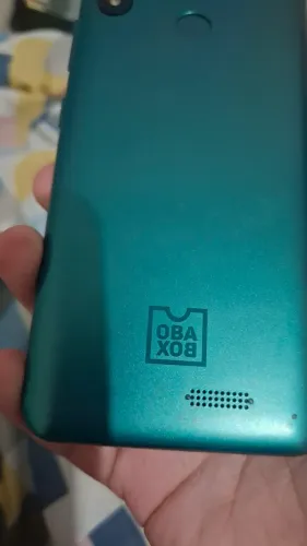OBA BOX - celular com a caixa, capinha e pelicula
