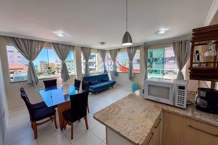 ALUGUE ANUAL MOBILIADO COBERTURA 2 SUÍTES COM TERRAÇO E VISTA LATERAL PARA O MAR  PRAIA DE