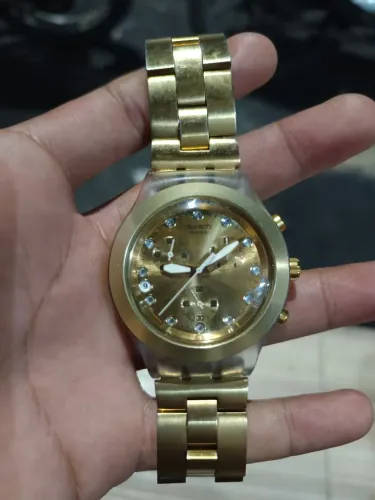 SWATCH FEMININO DOURADO