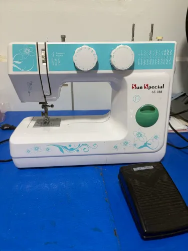 Máquina de costura doméstica