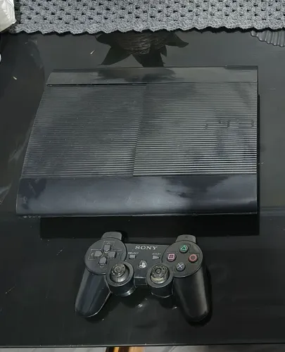 Ps3 super slim desbloqueado muito conservado.1 controle original.