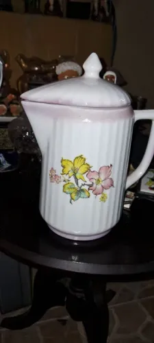 Chaleira de porcelana com flores imbulidor