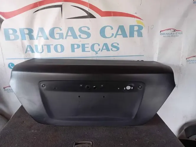 Tampa traseira versa 2011 a 2019