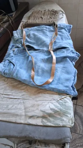 Vendo shorte e Bolsa de couro 