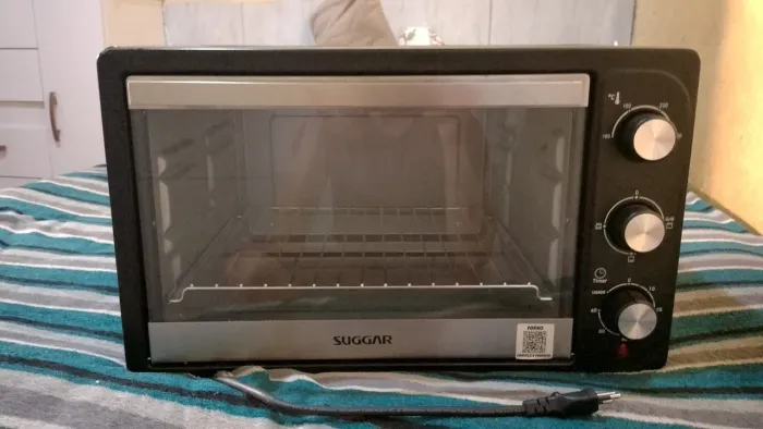Vendo forno elétrico semi novo 42 litros 400 chamar ZAP *