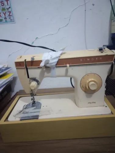 Máquina de costura singer