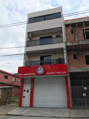 FACHADA EM ACM VERMELHA COM LOGO LUMINOSO