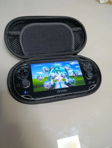 Sony PS Vita OLED + Case + Cabo original para Carregar