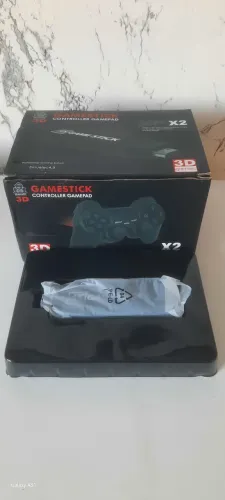 Vendo Game-stick novo na Caixa.