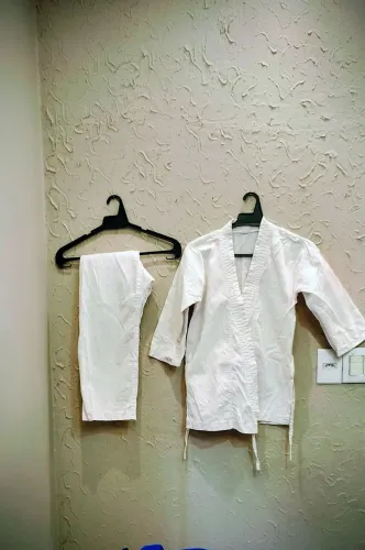 Kimono karatê e faixas