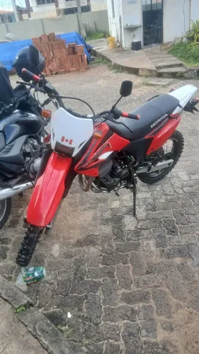 Moto pouco usada 60.000 KM rodados e so transferir está em meu nome