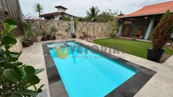 Casa com 4 dormitórios à venda, 255 m² por R$ 1.750.000 - Sumaré - Caraguatatuba/SP