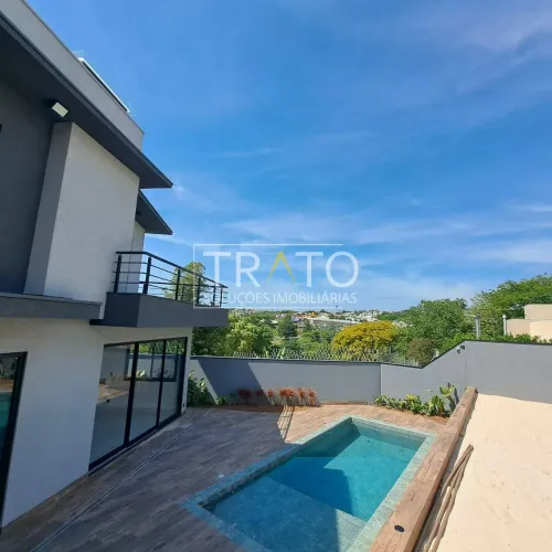 Casa à venda na cidade de Valinhos, com 3 suítes, quadra de areia e piscina