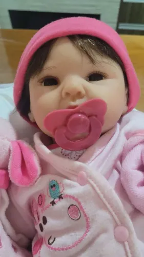 Boneca bebê Reborn com Moisés.